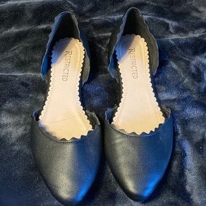 Restricted black flats size 8.5